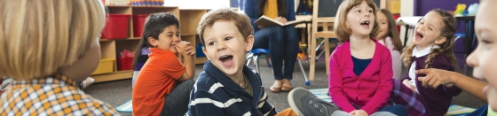 Children laughing on floor
