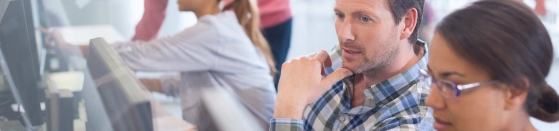 Students at computers in adult education classroom